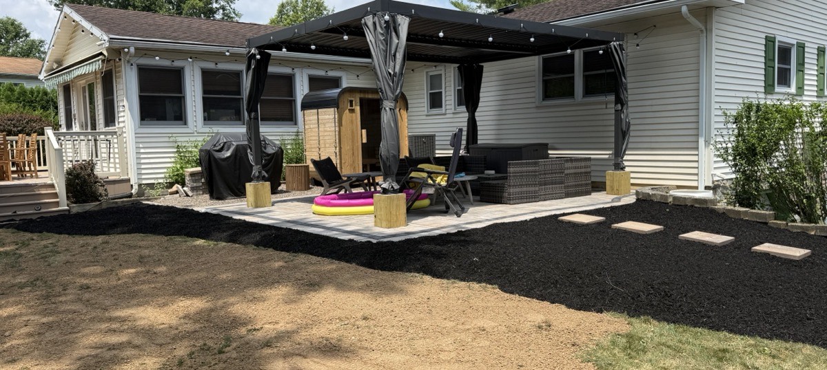 Finished paver patio with pergola installed by Alejandros Landscaping